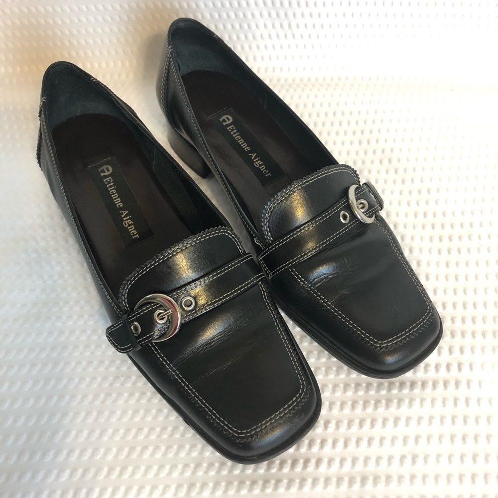 Dark brown leather shoes by Etienne Aigner.